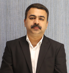 Dr. Manesh Thomas